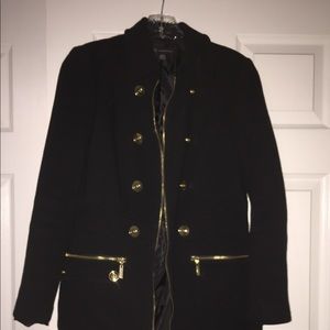 Black Coat with gold accessories.